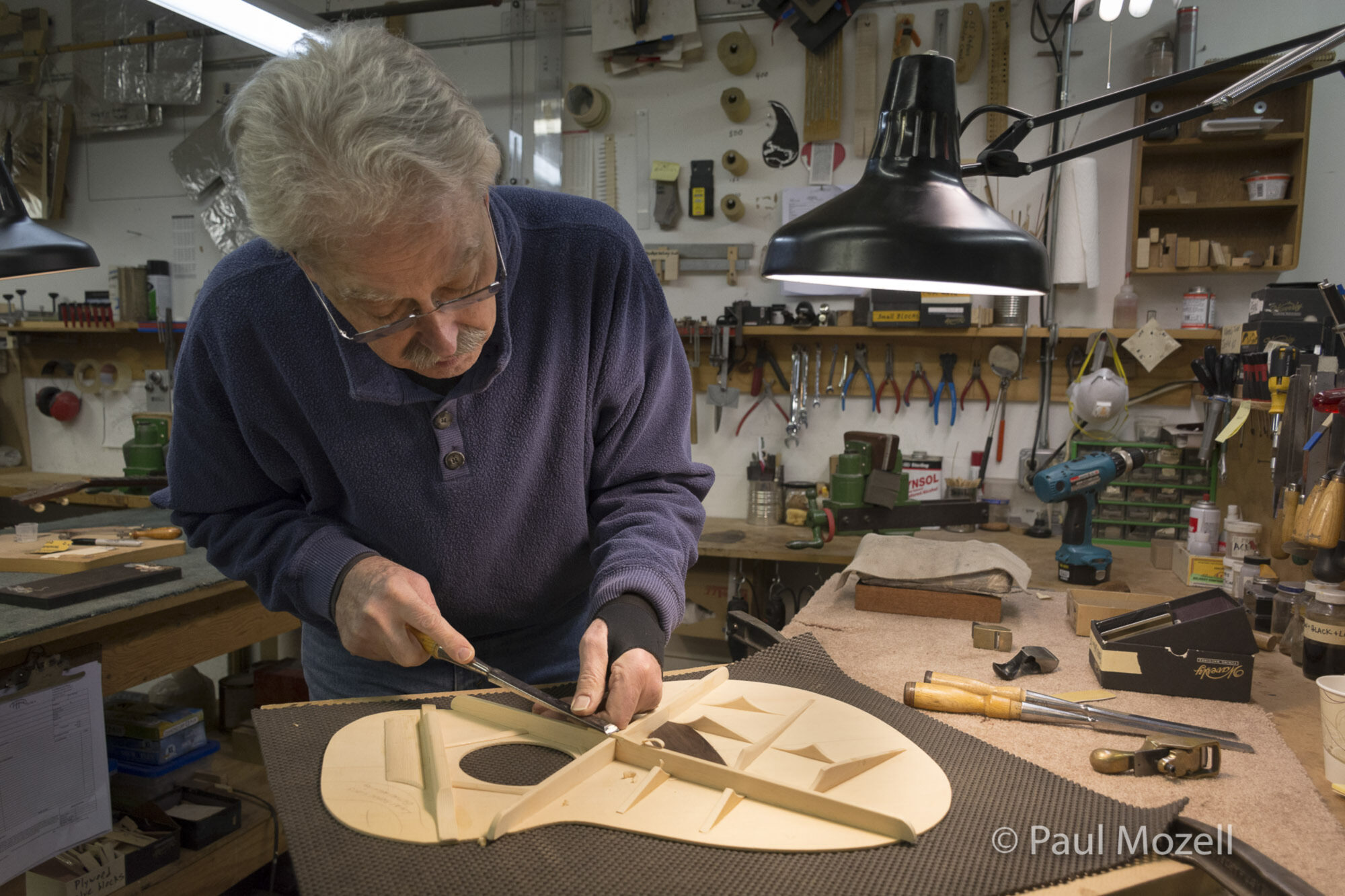 Shaping the braces on a spruce top.